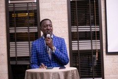 Pastor Fred Kilonzo delivers the Word for the day.