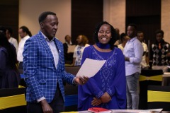 KFWN Secretary Rose Kainda and Pastor Fred Kilonzo join in the hymn "Leaning on the Everlasting Arms".