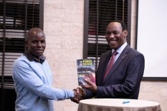 Dr Ezekiel Mutua with author Bernard Maingi.