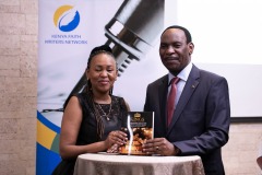Dr Ezekiel Mutua with author Paulie Mugo.
